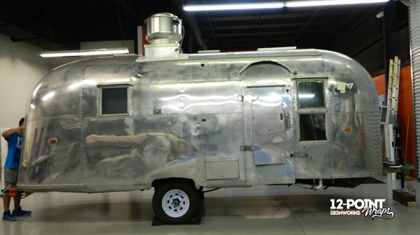 Airstream trailer in our shop prior to the installation of Two Thompsons cut vinyl. 12-Point SignWorks