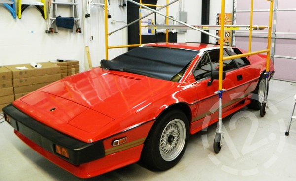 Scaffolding above the 1984 Lotus Esprit in the 12-Point SignWorks shop. 