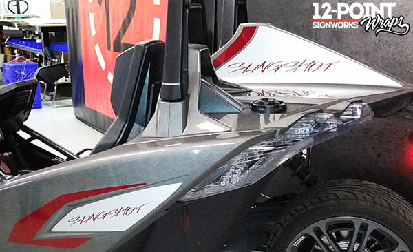 A close-up of the custom dorsal and C-stripe graphics on the Polaris Slingshot. 12-Point SignWorks