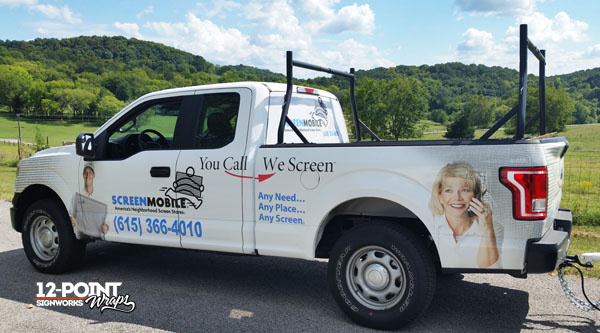 A side view of the Screenmobile of Nashville's Ford F150 wrapped by 12-Point SignWorks in Franklin, TN.
