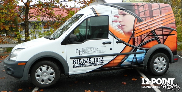 The completed advertising wrap on the Brentwood Blind Company's Ford Transit Connect by 12-Point SignWorks.