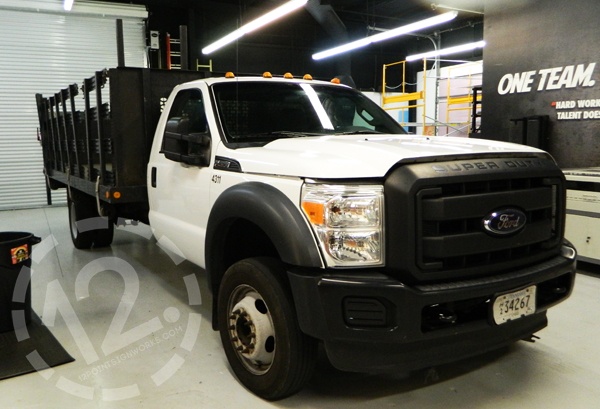 The F-450 cleaned with the decals removed and in the 12-Point SignWorks shop. 